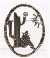A Mexican Sterling Brooch w/turquoise bead,