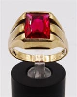A Man's 10k Gold Ring w/ruby colored stone,