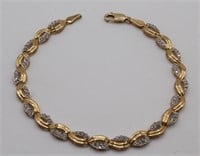 A Ladies 14k Gold & Diamond Bracelet, stamped 14k