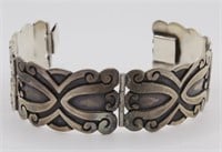 A Modernist Sterling Silver Bracelet w/4 scroll