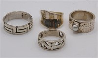 4 Modern Sterling Rings, one with pearl mounting,