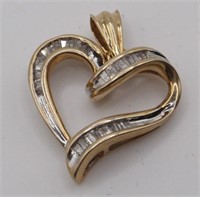 A 14k Gold & Diamond Heart Shape Pendant,