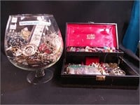 Container of costume jewelry including