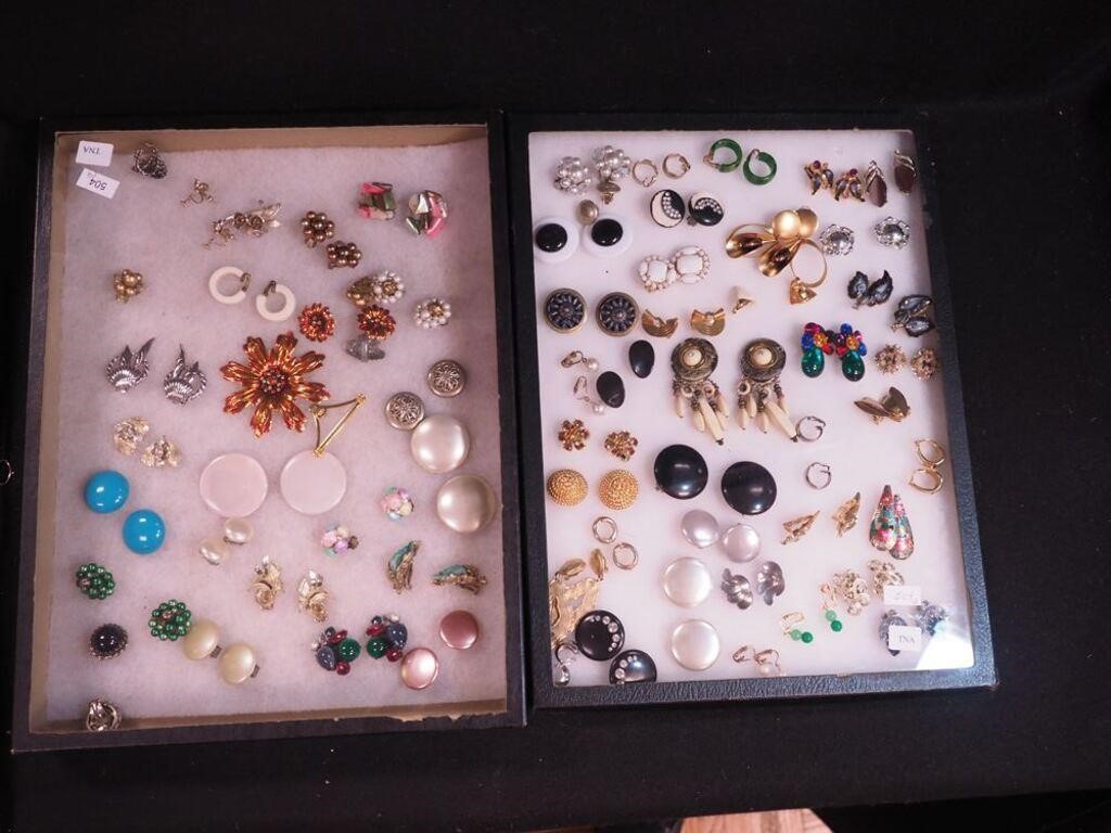 Two containers of mostly earrings including