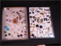Two containers of mostly earrings including