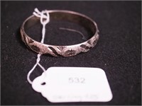 Sterling bangle bracelet with carved design