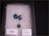 Pair of 14K yellow gold earrings with large blue