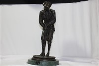 A Bronze Golfer Statue