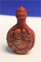 A Carved Resin Snuff Bottle