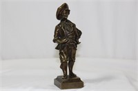 A Solid Bronze Boy Figurine