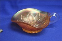 A Carnival Glass One Handle Bowl