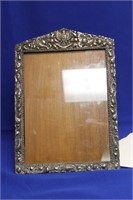 An Antique Sterling Ornate Frame