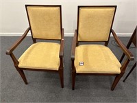 Pair of yellow upholstered armchairs