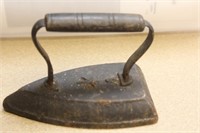 A Vintage Cast Iron Cloth Iron