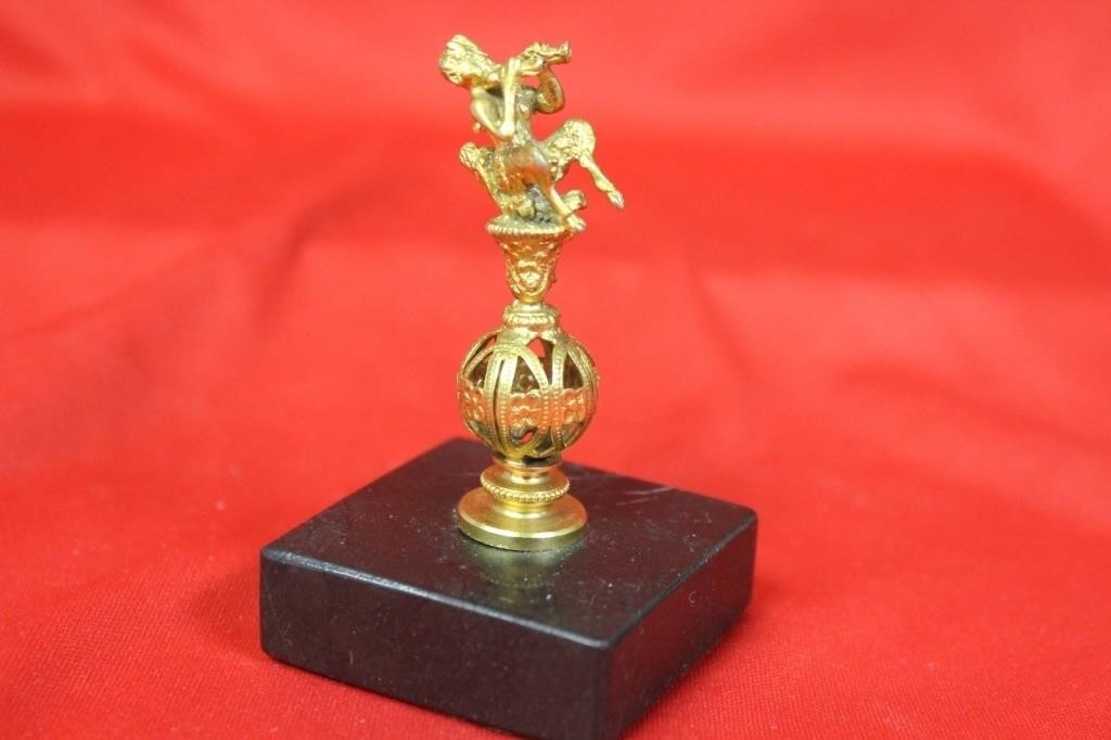 A Vintage Small Statue On Marble Stand