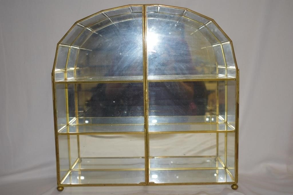A Small Glass Curio Cabinet