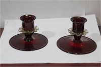 A Pair of Ruby Glass Candlesticks