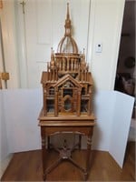 Victorian style birdcage on table