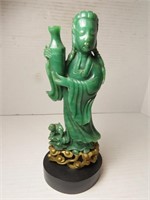 Carved figure Jade color
