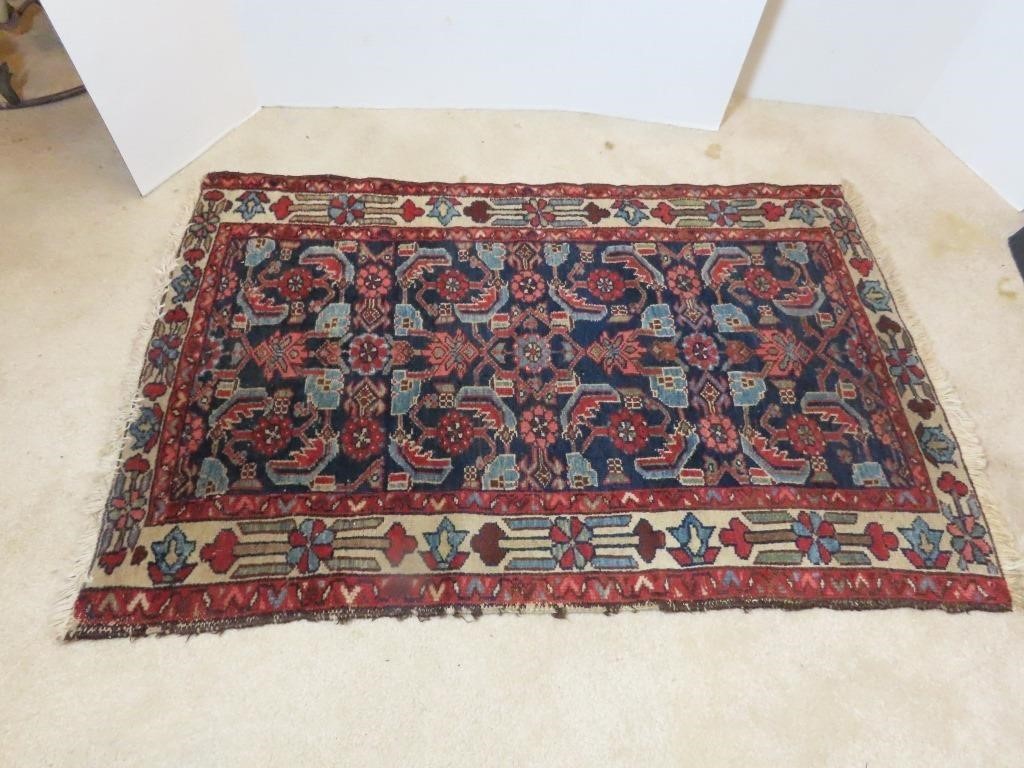 Cobalt and red area rug