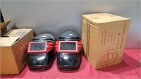 3 welders helmets 1 new sealed in the box