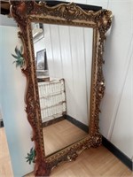 >Large decorative mirror with gold/red frame, 56"