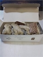 Mostly full box of animal print string pricing tag