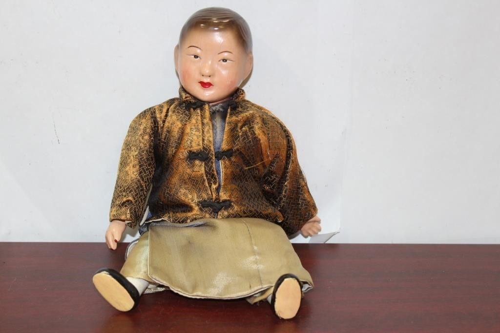 A Vintage Lacquer Doll