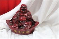 A Resin Buddha Figurine