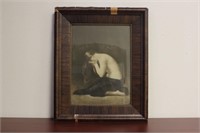 A Print/Etching/Photograph of a Nude Lady