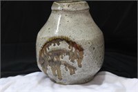 A Hand Painted Pottery Bottle