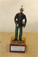 Metal Soldier on Wooden Stand