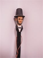 Walking stick with Abraham Lincoln bust carved in