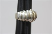 A Sterling and 14Karat Gold Ring