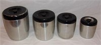 Vintage aluminum canister set.
