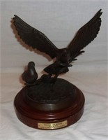 Metal casting bird statue.