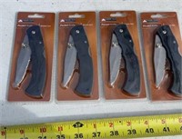 4 sealed Ozark Trail Pocket Knives