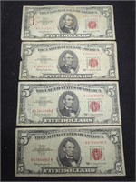 Four 1963 $5 Red Seal US paper money bills