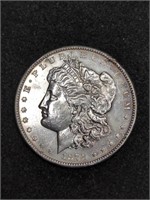 1878-CC Morgan Silver Dollar marked AU / UNC