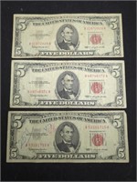 Three 1963 $5 Red Seal US paper money bills