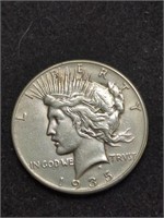 1935 Peace Silver Dollar marked Brilliant