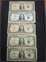 Five $1 US Silver certificate paper money bills