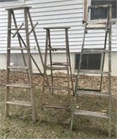 Three wooden Step Ladders (two are broken)