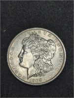 1900 Morgan Silver Dollar coin marked Uncirculated