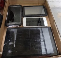 TRAY OF CELL PHONES AND TABLETS