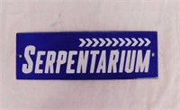 Newer Serpentarium arrow porcelain sign, 12" x 4"