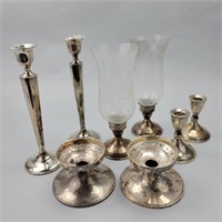 4 Pairs Weighted Sterling Candlestick Holders.