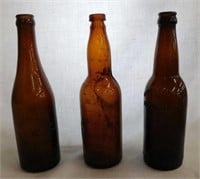 2 brown Michigan blob top bottles: