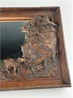 Carved wooden scene mirror