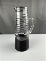 Tall glass pitcher